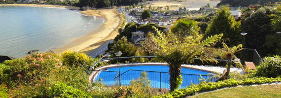 Swimming pool at The Haven with views over Kaiteriteri Bay